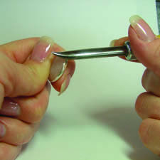 Burnisher pressing on the bezel cup